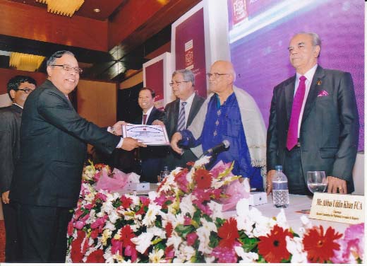 Finance Minister AMA Muhith, presenting ICAB award "Certificate of Merit"-2013 to Helal Ahmed Chowdhury, Managing Director of Pubali Bank Limited for presenting best annual report recently.
