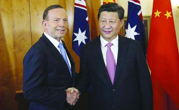 Chinese President Xi Jinping (right) with Australian PM Tony Abbott at Parliament House in Canberra.