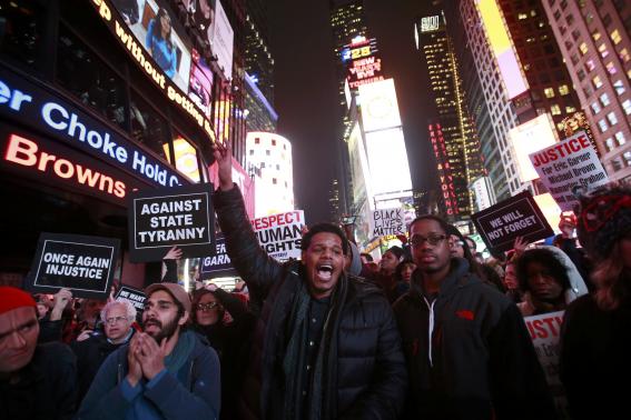 Protesters shout slogans in Times Square, New York, December 3, 2014.