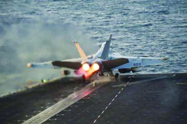 An EA-18G Growler launches from the Nimitz-class aircraft carrier USS Carl Vinson (CVN 70) in this US Navy picture taken in the Arabian Gulf.