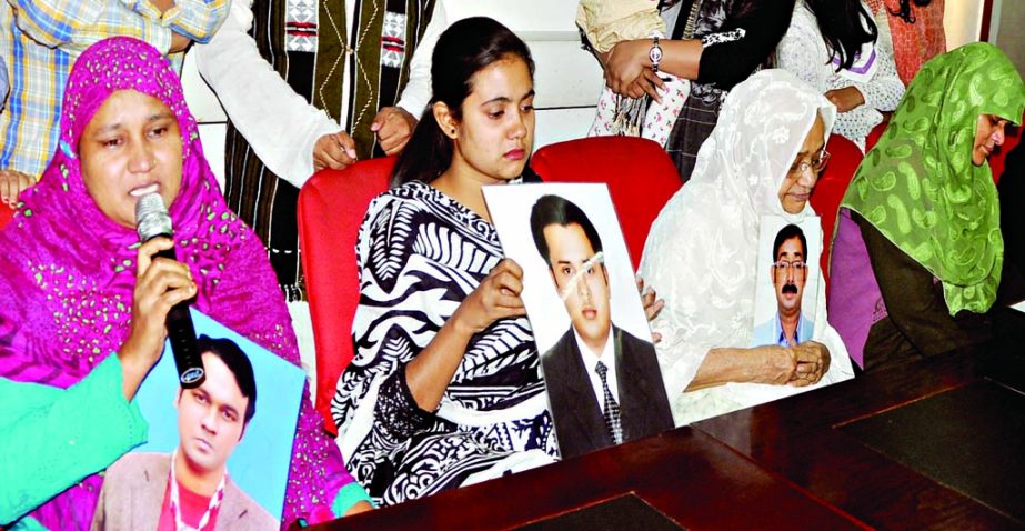 Family members of the victims who were picked up one year ago from different city areas by persons identifying themselves as law enforcers, gathered at Jatiya Press Club on Thursday with photos of their near and dear ones urging the Prime Minister Sheikh