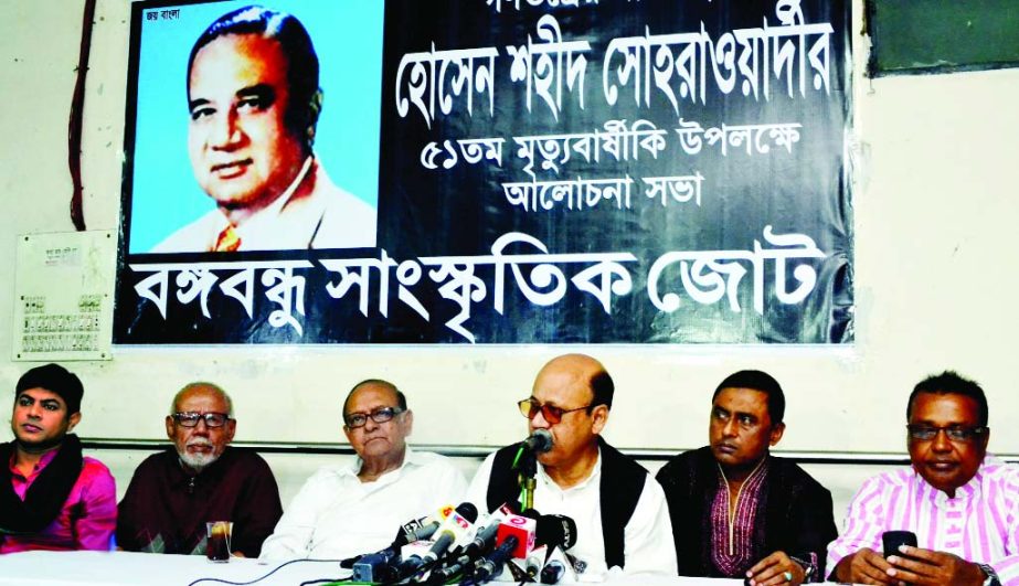 Food Minister Quamrul Islam speaking at a discussion organised on the occasion of 51st death anniversary of Huseyn Shaheed Suhrawardy at Shilpakala Academy in the city on Friday.