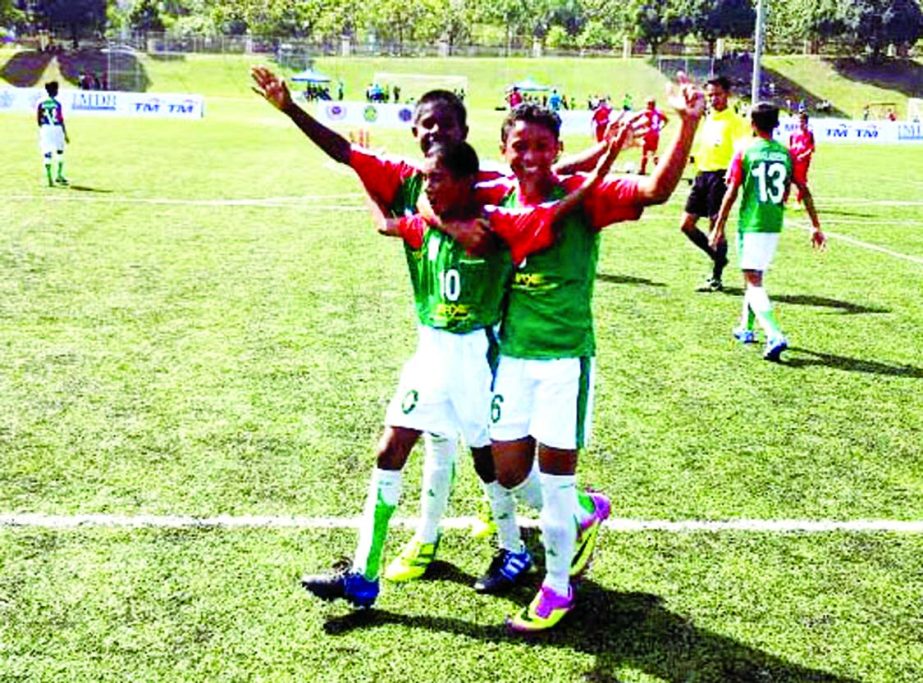 Players of Bangladesh Under-12 Football team celebrate after scoring goal against Sevill FC Under-12 Football team in their first match of the Super Mokh Cup in Malaysia on Friday.