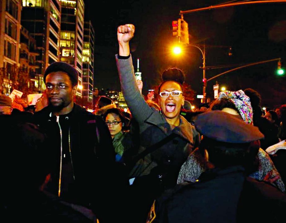 Protesters march on the West Side Highway in lower Manhattan in New York City as thousands of demonstrators took to the streets demanding justice for the death of Eric Garner December 4, 2014.