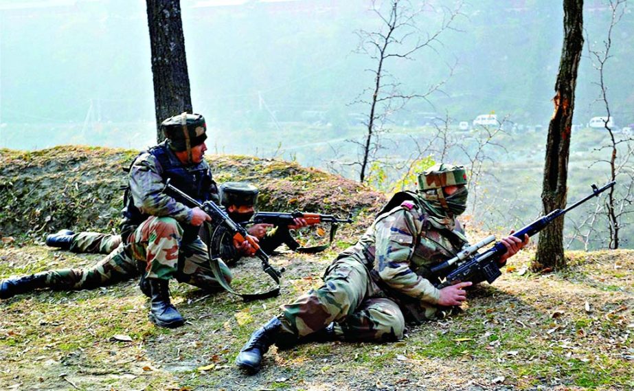 Army personnel take position after the suicide attack by militants at Mohura Army camp, in Uri.