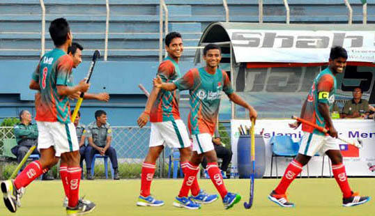 Players of Bangladesh Under-21 Hockey team celebrate after scoring a goal against Sri Lanka Under-21 Hockey team in their match of the Junior AHF Cup Hockey Tournament at the Moulana Bhashani National Hockey Stadium on Saturday.