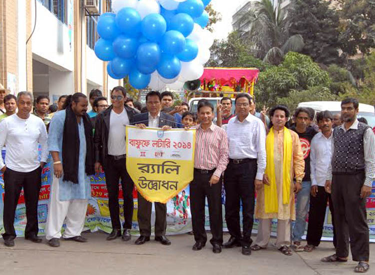 Senior Vice-President of Bangladesh Football Federation Abdus Salam Murshedy inaugurating the Rally of BFF Lottery by releasing the balloons as the chief guest in front of the BFF House on Saturday.