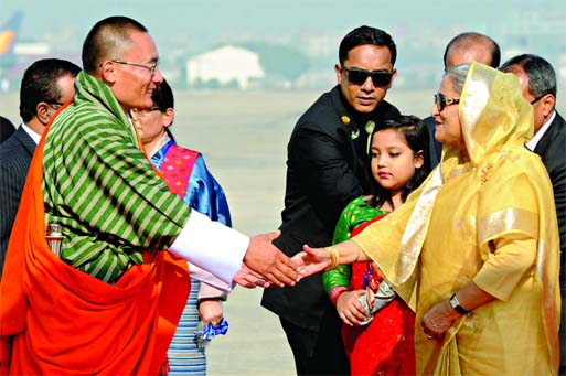 Prime Minister Sheikh Hasina receiving her Bhutanese counterpart TShering Tobgay at Hazrat Shahjalal International Airport on Saturday.