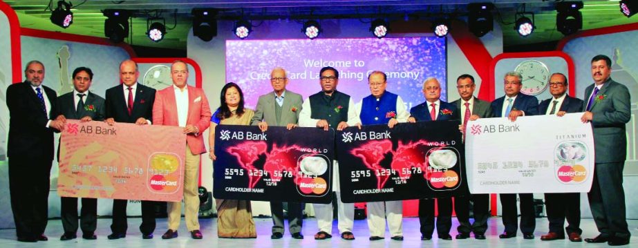 State Minister for Power, Energy and Mineral Resources Nasrul Hamid, launching the World MasterCard Credit Card of AB Bank Limited at a ceremony in Dhaka recently. Shamim Ahmed Chowdhury, Managing Director, First Sponsor Chairman M Morshed Khan of the ba