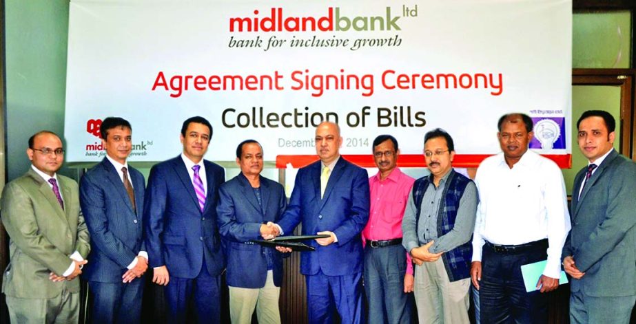 Khodoker Nayeemul Kabir, Deputy Managing Director of Midland Bank Limited and ARM Harisur Rahman, Director (Finance), Bangladesh Rural Electrification Board sign an agreement for bill collection at REB head office recently.