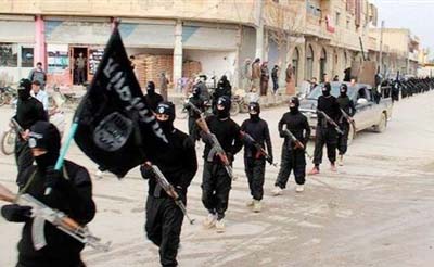 AP file photo of Islamic State militants.
