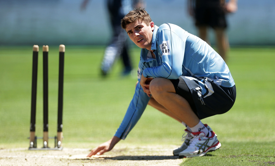 Sean Abbott has a look at the pitch at New South Wales' training session in Sydney on Monday.