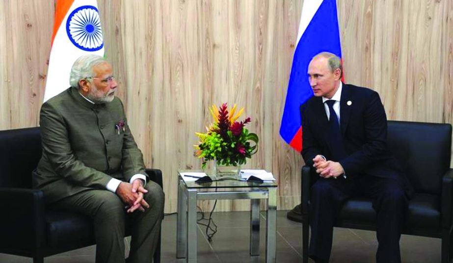 Russia's President Vladimir Putin Â® meets with Prime Minister Narendra Modi during the sixth BRICS Summit in Fortaleza July 15.