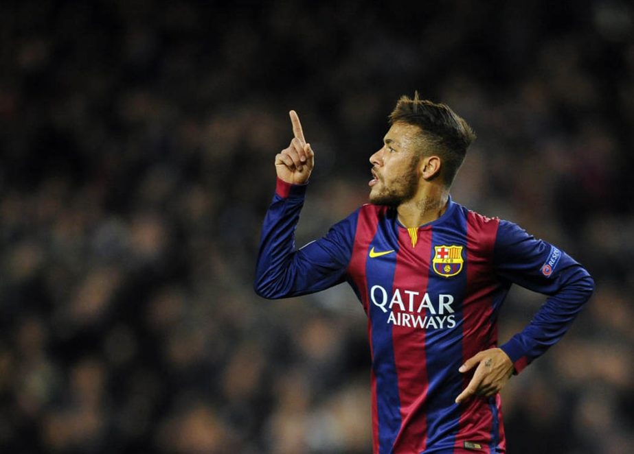 Barcelona's Neymar celebrates his side's 2nd goal during the Group F Champions League soccer match between FC Barcelona and PSG at the Camp Nou stadium in Barcelona, Spain on Wednesday.