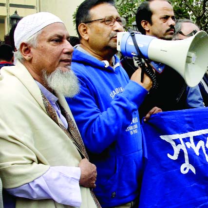 POBA organises a human chain on Thursday in front of city's National Museum demanding to take immediate steps to clear oil spill from the waters around the Sundarbans.