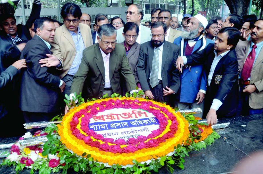 Newly appointed Chief Engineer of Local Government Engineering Department (LGED) Shyama Prosad Adhikari placing floral wreaths at the portrait of Bangabandhu Sheikh Mujibur Rahman at Dhanmondi on Friday.