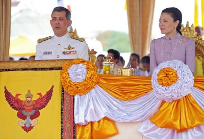 Thai Crown Prince Maha Vajiralongkorn (L) and Princess Srirasmi as they at the annual Royal Ploughing Ceremony at Sanam Luang in Bangkok .