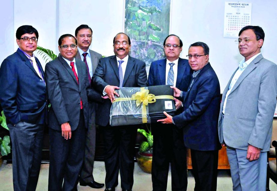 KS Tabrez, Managing Director of Dutch-Bangla Bank handing over 10,000 blankets to SK Sur Chowdhury, Deputy Governor of Bangladesh Bank for distributing among the cold hit poor people of the country at BB head office recently.