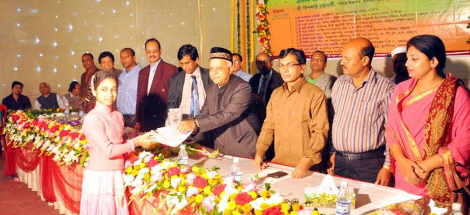 CCC Mayor M Monzoor Alam distributing crest and certificate among the students who got scholarship from the Chittagong Trust at a function in the city yesterday.