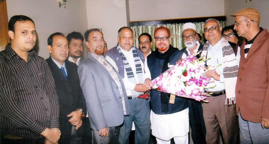 Leaders and activists greeted Jatiya Sramik President Shukur Mahmood at a function in the city yesterday.