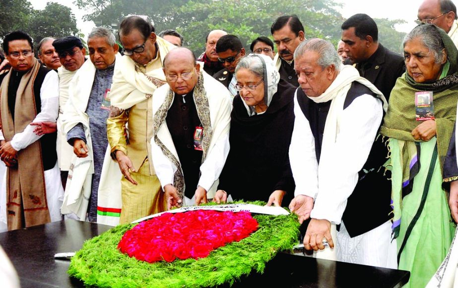 Senior Awami League leaders alongwith Prime Minister Sheikh Hasina placing wreaths at the Martyred Intellectuals' Mausoleum in Mirpur on Sunday.
