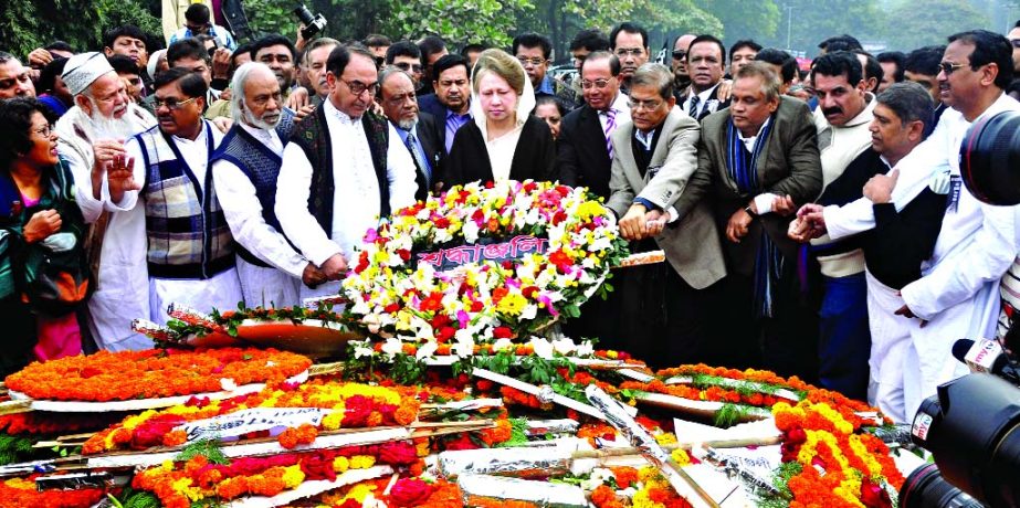 BNP leaders and workers led by Chairperson Begum Khaleda Zia place wreaths at Mirpur Martyred Intellectuals' Mausoleum marking the Martyred Intellectuals' Day on Sunday .