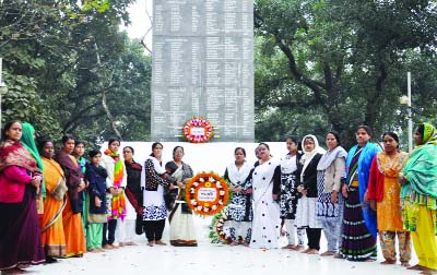 DINAJPUR: Wreaths being placed by members of Bangladesh Mohila Awami League, Dinajpur City Unit on the occasion of the Martyred Intellectualsâ€™ Day on Sunday.