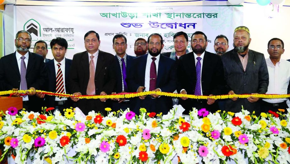 Habibur Rahman, Managing Director of Al-Arafah Islami Bank Limited, inaugurating the new premises of the bank at Sharak Bazaar, Akhaura in Brahmanbaria recently.