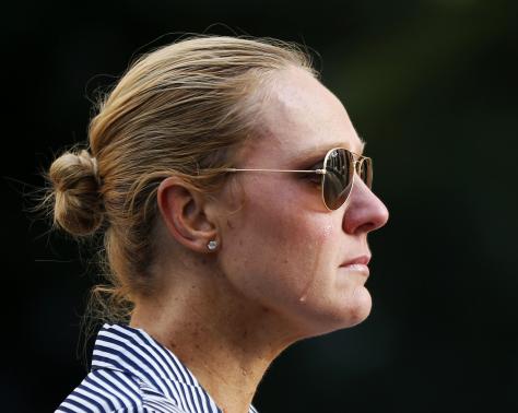 Sydney resident Kate Golder cries as she observes the site of a Sydney cafe siege after it ended in Martin Place, December 16, 2014.