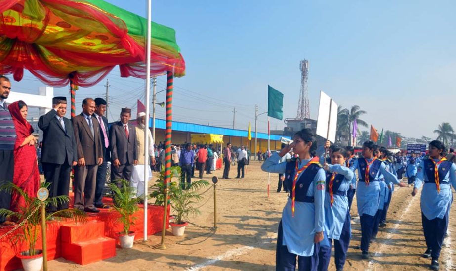 CCC Mayor M Monzurul Alam taking salute at the march-past of Victory Day at City Corporation Stadium on Tuesday.