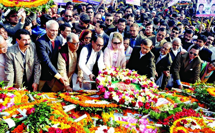 BNP Chairperson Begum Khaleda Zia along with her party colleagues paying tributes to martyred freedom fighters by placing floral wreaths at the altar of Savar National Memorial on Tuesday on the occasion of glorious Victory Day.