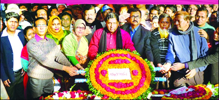 Dr Md Nurul Alam Talukder, Managing Director of Bangladesh House Building Finance Corporation and employees pay tribute by placing wreaths at the National Memorial at Savar and at the portrait of Father of the Nation Bangabandhu Sheikh Mujibur Rahman on t