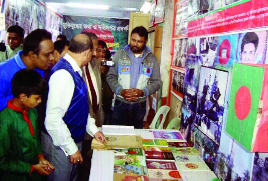 BARISAL: Visitors at a daylong exhibition on Liberation War at Barisal Reporters' Unity (BRU) premises to mark the Victory Day on Tuesday.