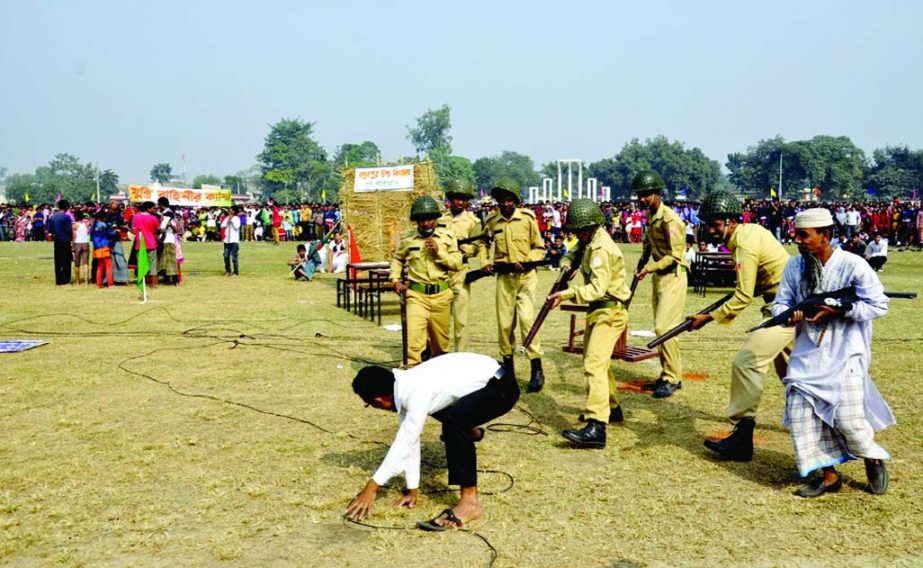 DINAJPUR: Students of Dinajpur High School participating at a display organised by District Administration at Boro Maidan marking the Victory Day on Tuesday.