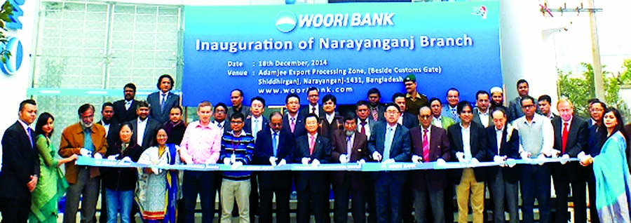 Sun Kyu Kim, Country Manager of Woori Bank Bangladesh, a South Korea's bank, inaugurating its 5th branch in Narayanganj EPZ on Thursday. Syed Nurul Islam, Member (Investment Promotion) of BEPZA was present.