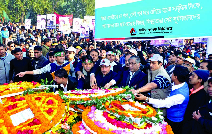 Ahmed Kamal Khan Chowdhury, Managing Director and Habibur Rahman, DMD along with employees of Prime Bank Limited placing wreaths to the 1971 Liberation War martyrs at National Memorial in Savar on Victory Day.