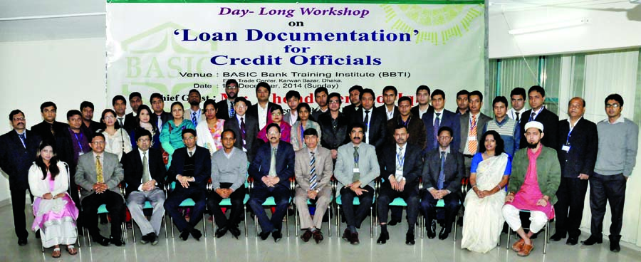 M Kamran Hamid, DGM and Principal of BASIC Bank Training Institute, poses with the trainees of a daylong workshop on 'Loan Documentation' at its training institute recently.