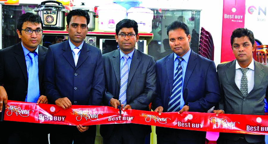 RN Paul, Director of RFL, a concern of Pran Group, inaugurating its outlet at Indira Road in the city recently. Gias Uddin Biswas, AGM, Mehedi Hasan, Assistant Brand Manager and Ahsan Uddin, Sales Manager of RFL Best Buy were present.