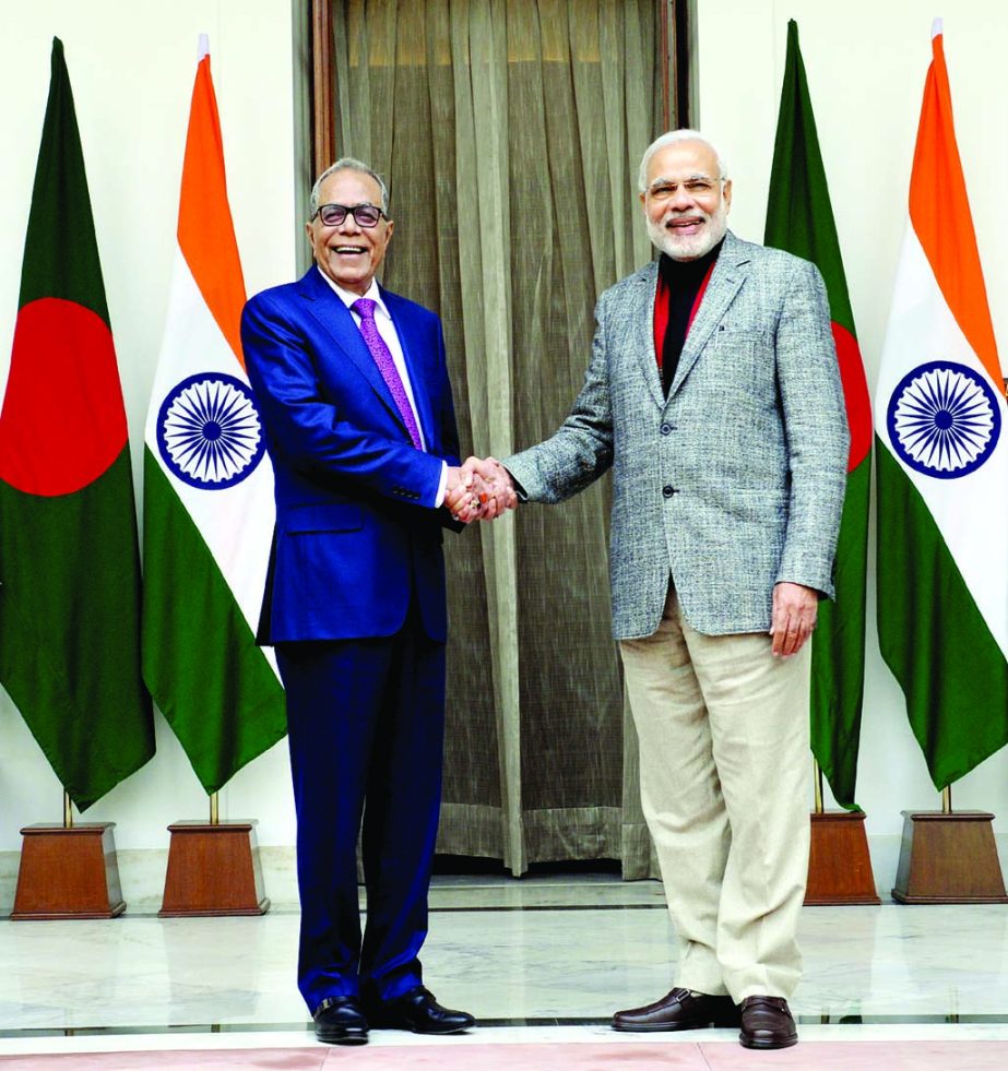 President Abdul Hamid and Indian Prime Minister Narendra Modi shaking hands after talking outstanding issues of both the countries at Hyderabad House in Delhi on Friday. PID photo