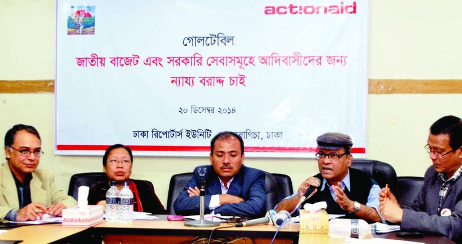 Dhaka University teacher Prof MM Akash speaking at a press conference demanding adequate allocation for indigenous people in the national budget.