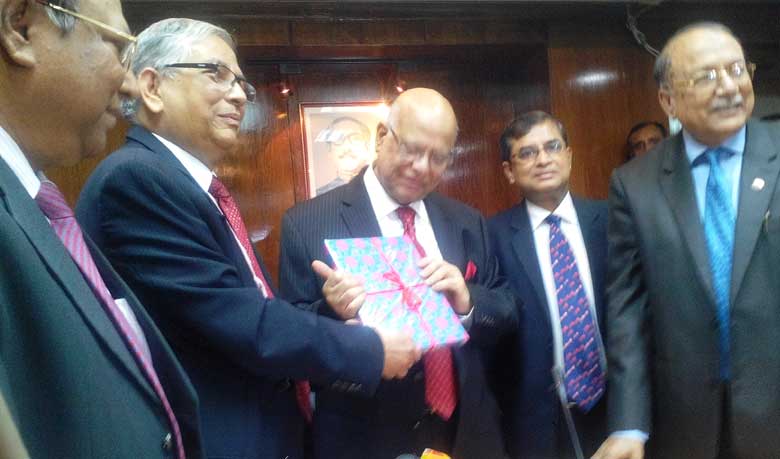 Mohammad Farashuddin submitting the report to the Finance Minister Abul Maal Abdul Muhith