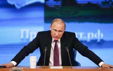 Russian President Vladimir Putin speaks during his annual end-of-year news conference in Moscow.