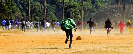 Police chasing protesters demanding second chance for admission tests at all universities. This photo was taken from Suhrawardy Uddyan area on Sunday.