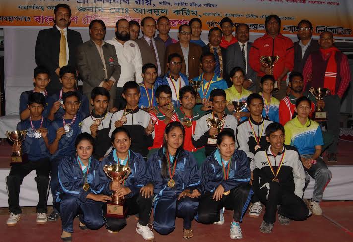 Photo shows the prize winners of the Dhaka Metropolis First Division Table Tennis League which concluded on Tuesday with trophies and guests at the Shaheed Tajuddin Ahmed Indoor Stadium.