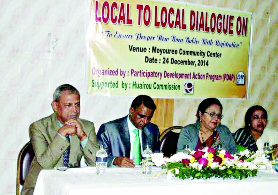 Mahbubul Islam, Chief Executive Officer, Zone-2 of Dhaka North City Corporation , among others, at a dialogue on 'Newborn babies' birth registration' organised by Participatory Development Action Programme at a community center in the city's Mirpur on