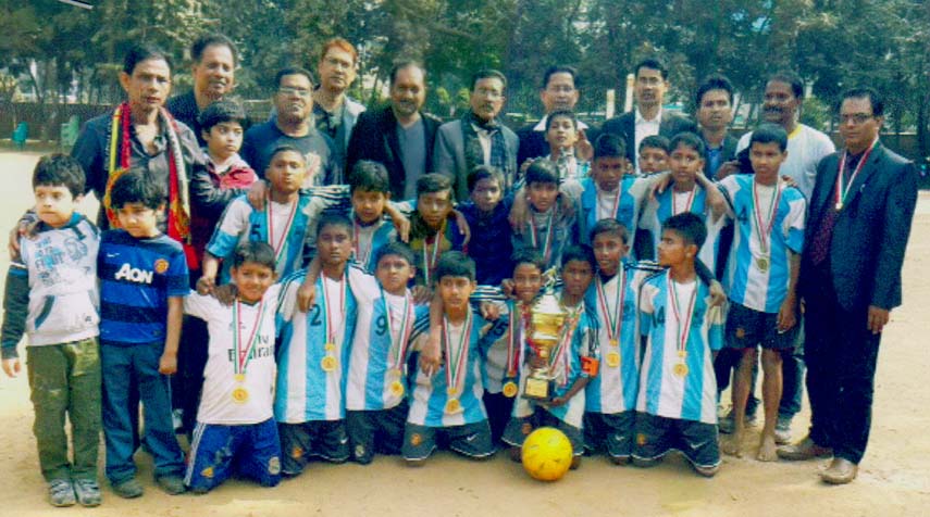 Players of Dholaipar Goverment Primary School, who became unbeaten champion in Bangabandhu Gold Cup Primary School Football tournament held at Mirpur Army Goverment Primary School ground pose for photo with the guests recently.