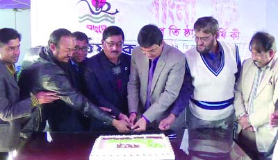 JHALAKATI: Mr Shakhawat Hossain, DC , Jhalakati cutting cake on the occasion of the 62nd founding anniversary of the Daily Ittefaq on Wednesday.