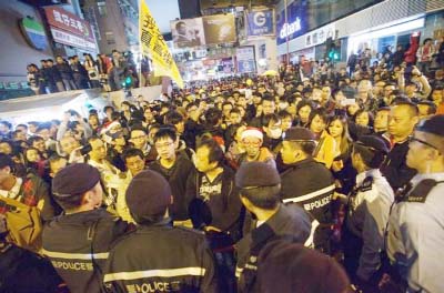 Police used pepper spray and batons to break up Wednesday's protest in Mong Kok neighbourhood.