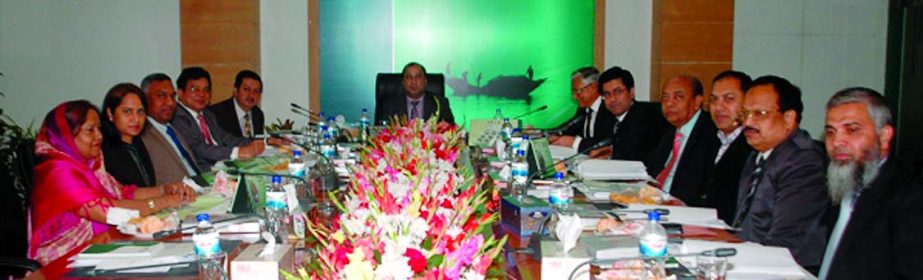 Humayun Kabir, Chairman of the Board of Directors of Modhumoti Bank Limited, presiding over the board meeting of the bank at its head office recently.