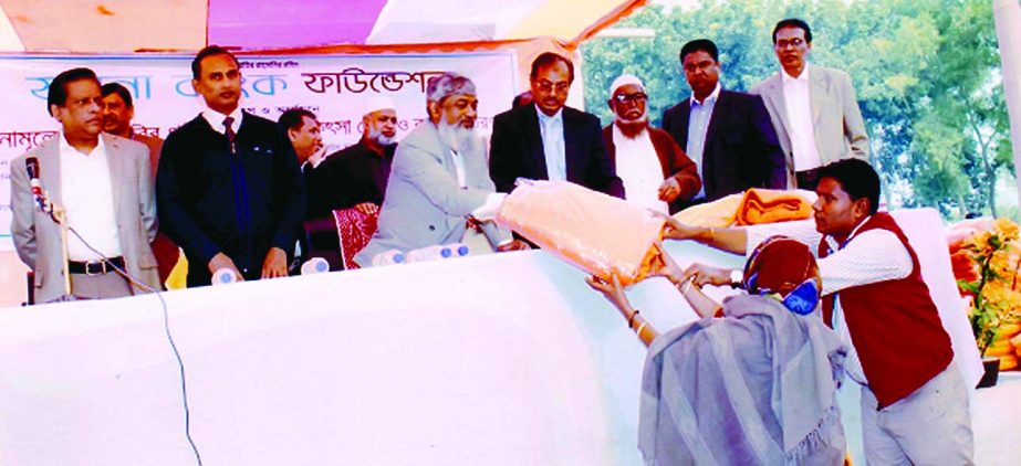 Khandoker Anowarul Islam, Secretary, Ministry of Road Transport and Bridge Division, inaugurating 'free eye camp and blanket distribution' programme organized by Jamuna Bank Foundation at Konra Govt Primary School, Nagarpur, Tangail recently. Al-Haj Nur